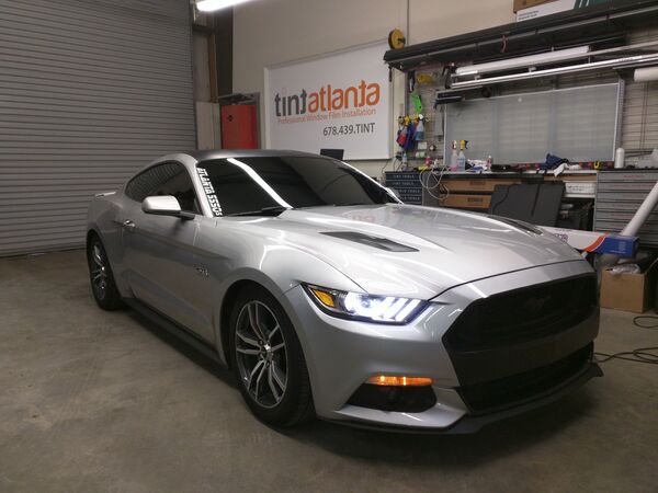 Silver Ford Mustang GT with dark ceramic window tint in Gainesville GA