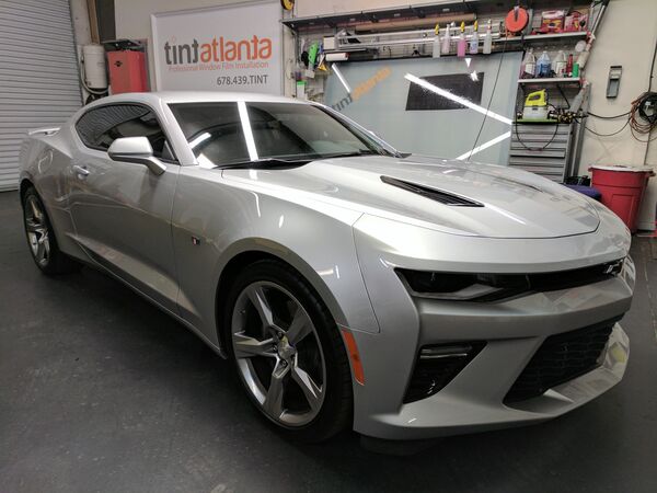 Silver Chevrolet Camaro SS with dark window tint installation Gainesville